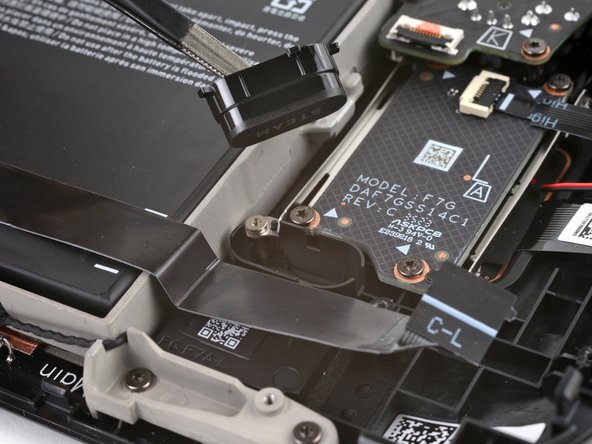 Steam Deck OLED Front Shell Replacement, Remove the Steam button: crwdns2935265:045crwdnd2935265:02crwdnd2935265:02crwdne2935265:0