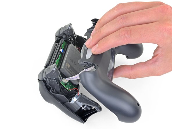 DualShock 4 CUH-ZCT2 Joystick Covers Replacement, Remove the rear panel: crwdns2935265:04crwdnd2935265:02crwdnd2935265:02crwdne2935265:0