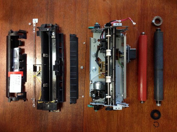 Lexmark T650 Fuser Roller Replacement, Remove the pressure roller: crwdns2935265:07crwdnd2935265:02crwdnd2935265:02crwdne2935265:0