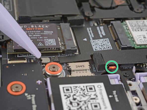 How to Reset the Mainboard in your Framework Laptop 12, Press the switch: step 9, image 3 of 3