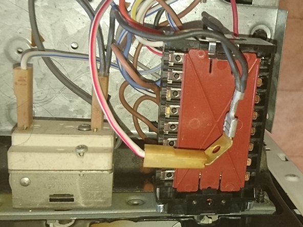 1990's Stove Philips Whirlpool oven switch replacement, connect the second red/white wire: crwdns2935265:06crwdnd2935265:01crwdnd2935265:01crwdne2935265:0