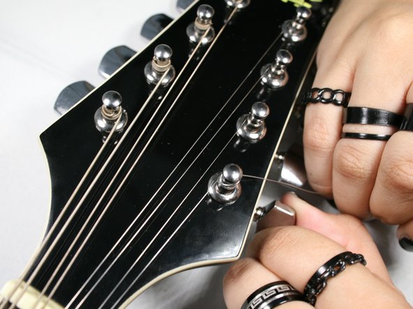 How to Replace the Strings on your Rogue RM-100A A-Style Mandolin: step 7, image 2 of 3