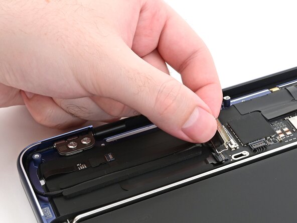 MacBook Neo Screen Replacement, Free the camera cable: adım 16, 3 resimden 1.