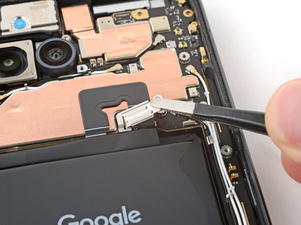 Google Pixel 9a Logic Board Replacement, Remove the battery connector cover: passo 16, immagine 2 di 3