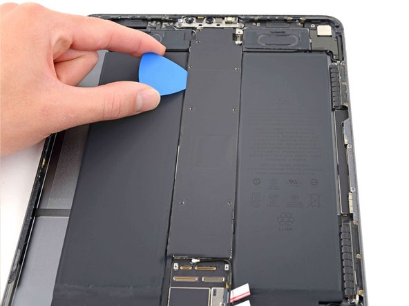 Logic Board Shield Removal, Separate the left edge shield adhesive: stap 0, afbeelding 3 van 3