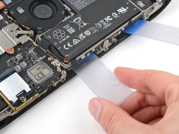 Steam Deck OLED Battery Replacement, Slice the battery adhesive: crwdns2935265:023crwdnd2935265:02crwdnd2935265:03crwdne2935265:0