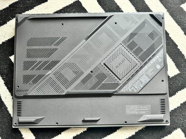 ROG Strix G16 (G614J) M.2 SSD Replacement, Remote the Backplate Screws: crwdns2935265:01crwdnd2935265:02crwdnd2935265:02crwdne2935265:0
