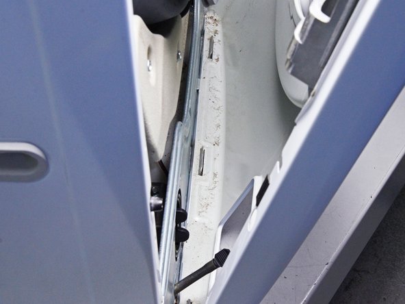 LG Front Load Washing Machine Temperature Sensor Replacement, Remove the front panel: crwdns2935265:025crwdnd2935265:02crwdnd2935265:03crwdne2935265:0