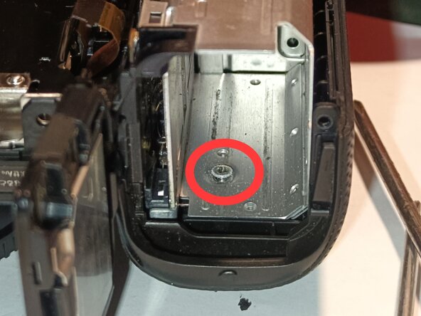 Teardown Sony ZV-E10 to reach SD card slot, Battery compartment screws: step 8, image 1 of 3