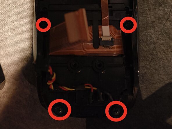 Logitech MX Air Battery Replacement, Unscrew, then disconnect another ribbon cable, and lift one up: crwdns2935265:05crwdnd2935265:01crwdnd2935265:03crwdne2935265:0