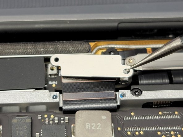 MacBook Pro 13" Two Thunderbolt Ports 2020 Touchbar Removal, Removing LCD Flex Cable Cover Plates: crwdns2935265:014crwdnd2935265:02crwdnd2935265:02crwdne2935265:0