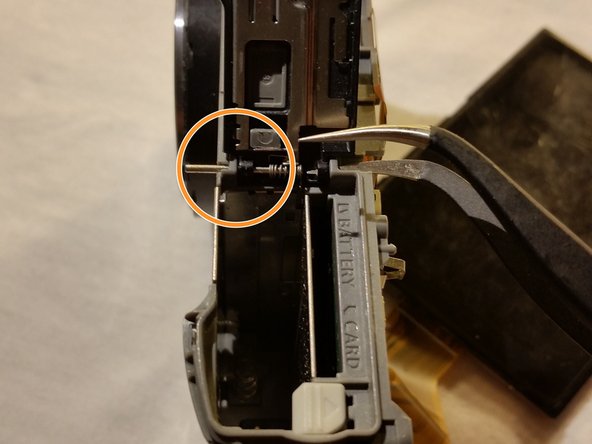 Panasonic Lumix DMC-ZS8 Battery Compartment Cover Replacement: crwdns2935265:03crwdnd2935265:02crwdnd2935265:02crwdne2935265:0