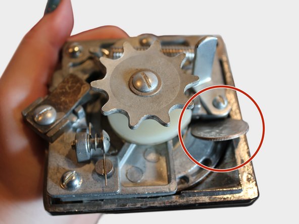 How to Fix a Stuck Quarter in a  Candy Machine: step 8, image 1 of 2