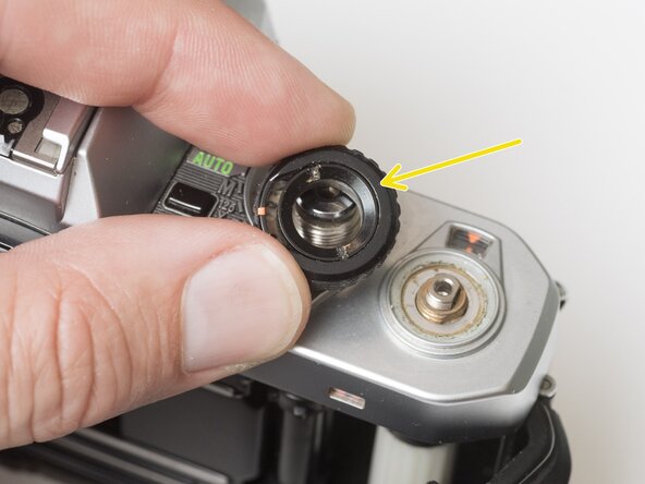 Pentax Super Program Top Cover Removal, Remove mode dial: crwdns2935265:02crwdnd2935265:02crwdnd2935265:02crwdne2935265:0