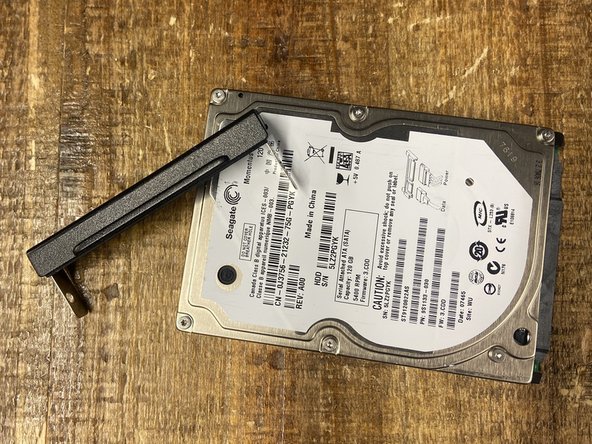 Dell Inspiron E1505 Hard drive Replacement, Hard drive bracket: crwdns2935265:03crwdnd2935265:03crwdnd2935265:03crwdne2935265:0
