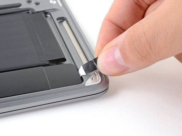 MacBook Air 13" Early 2020 Battery Replacement, Remove the right speaker adhesive: crwdns2935265:011crwdnd2935265:02crwdnd2935265:03crwdne2935265:0