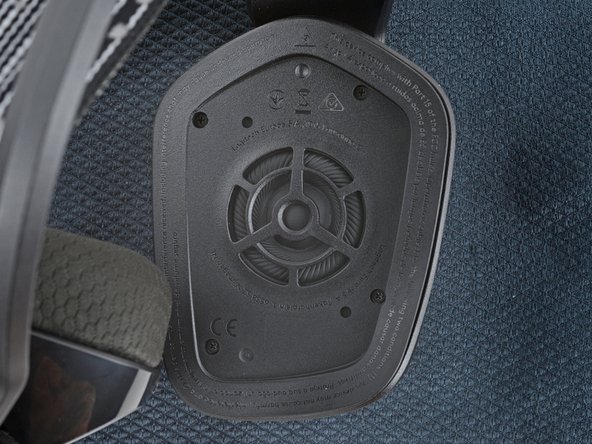 Logitech G733 Wireless Headset Battery Replacement, Remove the right speaker housing screws: crwdns2935265:04crwdnd2935265:02crwdnd2935265:02crwdne2935265:0