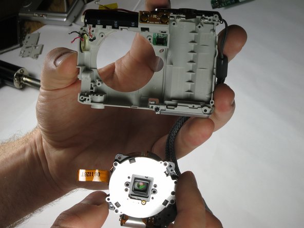 Olympus FE-170 Lens Replacement: crwdns2935265:018crwdnd2935265:03crwdnd2935265:03crwdne2935265:0