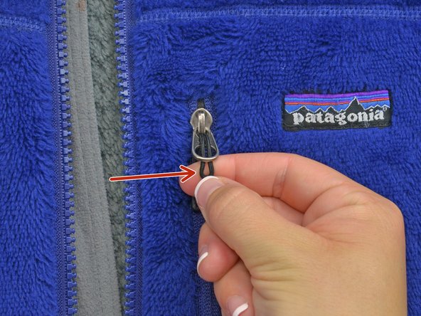 Zipper Pull Replacement, Thread the pull through the second hole: crwdns2935265:03crwdnd2935265:02crwdnd2935265:02crwdne2935265:0