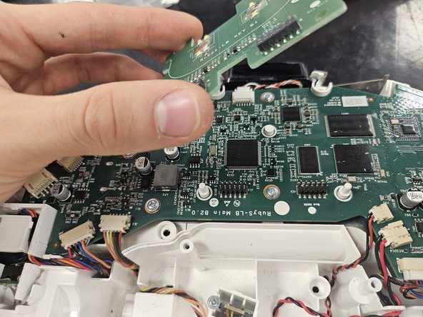Roborock S5 Max: Motherboard Replacement, Remove the PCBA that houses the buttons.: crwdns2935265:011crwdnd2935265:03crwdnd2935265:03crwdne2935265:0