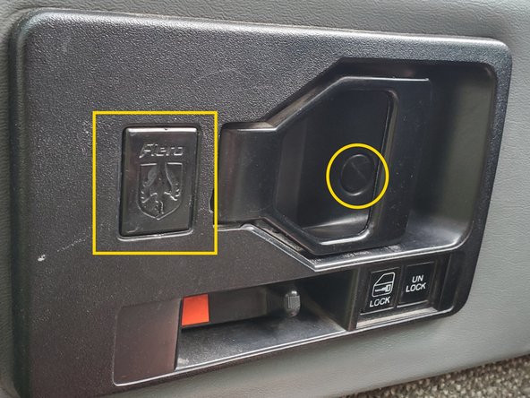 Pontiac Fiero - Remove interior door panel, Remove the screw covers: crwdns2935265:01crwdnd2935265:02crwdnd2935265:03crwdne2935265:0