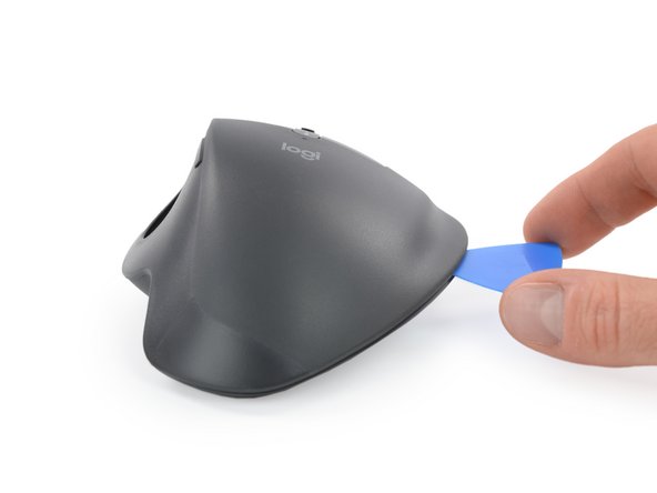 How to Open the Logitech MX Ergo, Release the plastic clips: crwdns2935265:05crwdnd2935265:02crwdnd2935265:03crwdne2935265:0