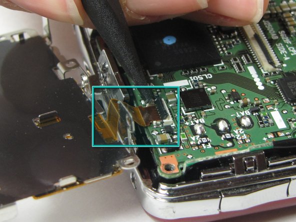 Sanyo VPC-X1200 Button Plate Replacement: crwdns2935265:06crwdnd2935265:02crwdnd2935265:02crwdne2935265:0