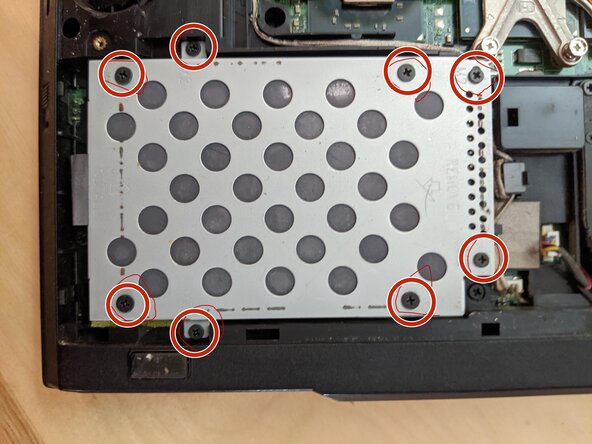 Dell Latitude E5400 Hard Drive Replacement, Remove the four screws that secure the hard drive to the computer.: crwdns2935265:02crwdnd2935265:01crwdnd2935265:01crwdne2935265:0