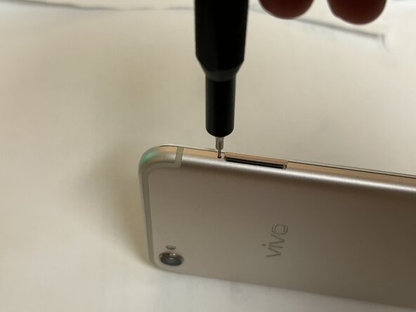 Vivo X9 Teardown, Remove SIM card tray: crwdns2935265:01crwdnd2935265:01crwdnd2935265:01crwdne2935265:0