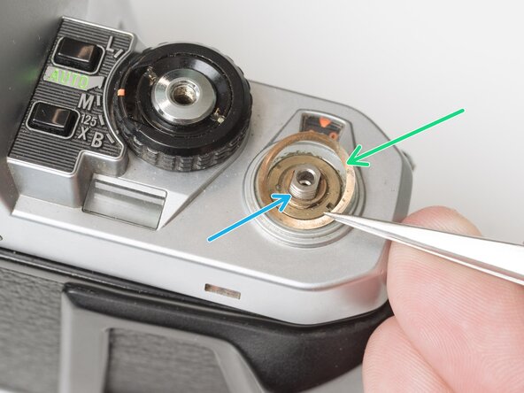 Pentax Super Program Top Cover Removal, Remove film advance lever: crwdns2935265:01crwdnd2935265:03crwdnd2935265:03crwdne2935265:0