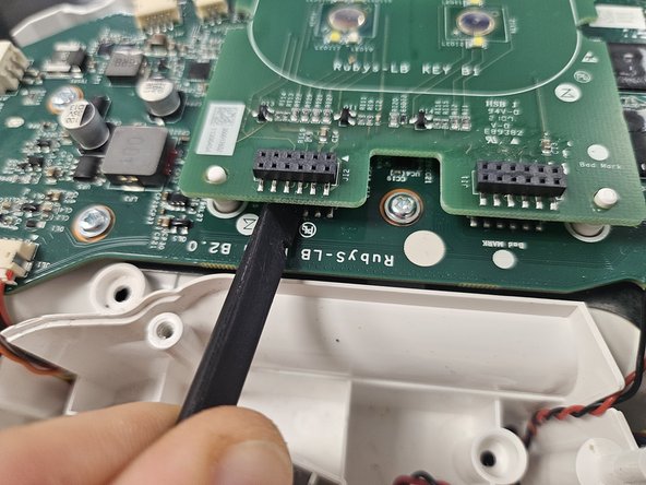 Roborock S5 Max: Motherboard Replacement, Remove the PCBA that houses the buttons.: crwdns2935265:011crwdnd2935265:02crwdnd2935265:03crwdne2935265:0