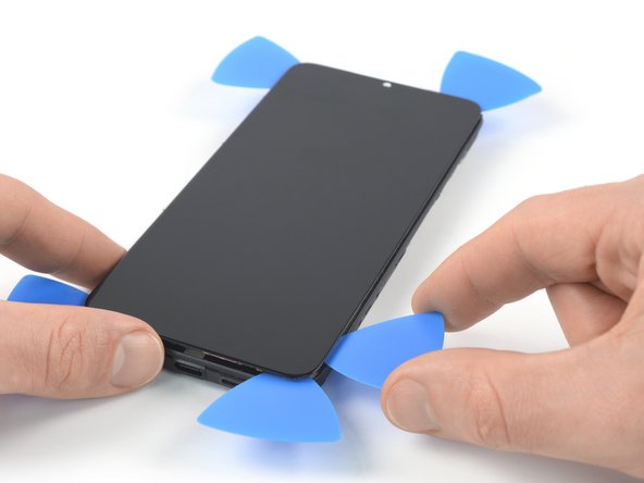 Xiaomi Redmi Note 9T Screen Replacement, Slice the right edge adhesive: crwdns2935265:034crwdnd2935265:03crwdnd2935265:03crwdne2935265:0