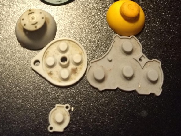 Most everything else in here can get a nice soak in mild detergent and water, but the board doesn't want soap or water. A soft toothbrush, Q-tips, and alcohol got her looking much better.