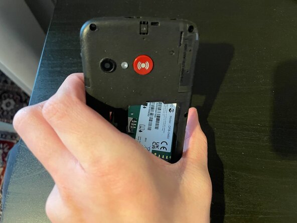 Doro 1881 Teardown, Remove the cover: crwdns2935265:04crwdnd2935265:03crwdnd2935265:03crwdne2935265:0