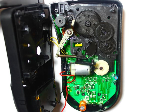 DYMO LabelPOINT 100 Rubber Transport Roller Replacement, Remove Back Panel: crwdns2935265:05crwdnd2935265:03crwdnd2935265:03crwdne2935265:0