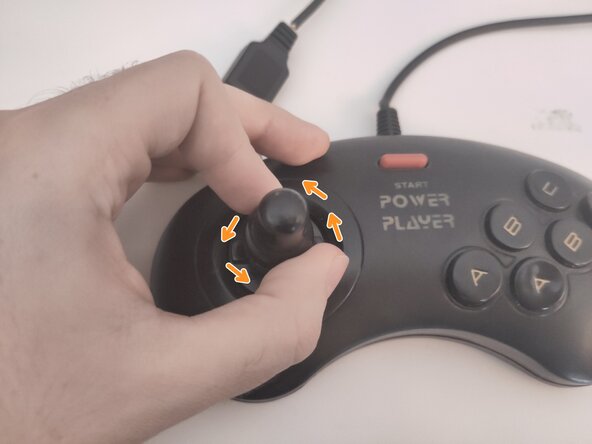 Power Player Super Joy III - Second Player Controller Teardown, Remove the D-Pad extender.: step 1, image 2 of 3