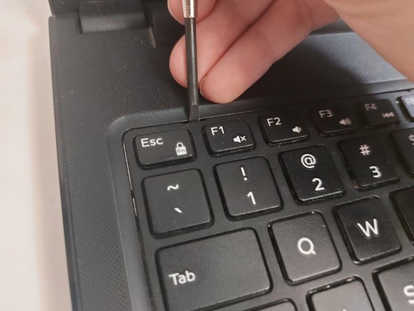 Dell Inspiron 15-3567 Fan Replacement, Remove the Keyboard - Release the Tabs: crwdns2935265:09crwdnd2935265:02crwdnd2935265:02crwdne2935265:0