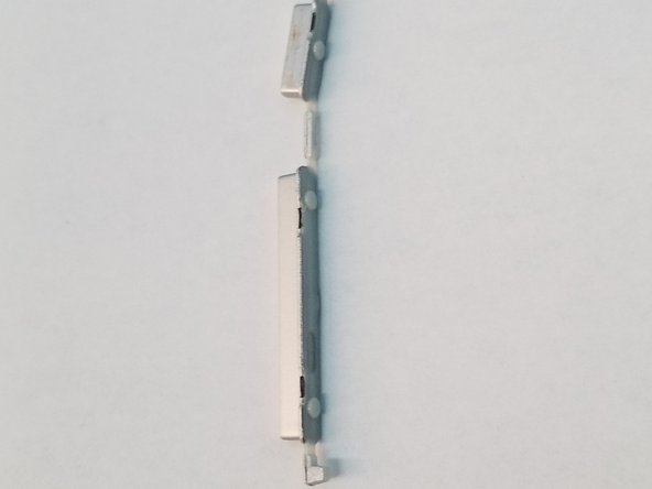 Nextbook Ares 10A Digitizer Replacement, Removing the power buttons: crwdns2935265:08crwdnd2935265:02crwdnd2935265:02crwdne2935265:0