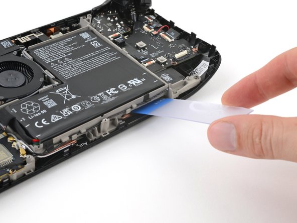 Steam Deck OLED Battery Replacement, Insert the plastic cards: crwdns2935265:022crwdnd2935265:02crwdnd2935265:03crwdne2935265:0