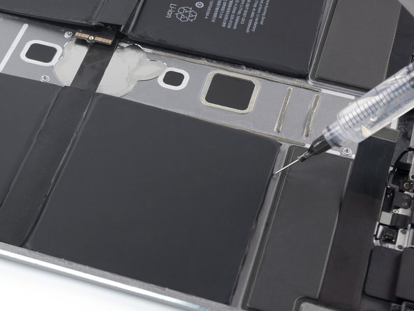 iPad Pro 12.9" 2nd Gen Battery Replacement, Loosen the top right battery cell: crwdns2935265:074crwdnd2935265:03crwdnd2935265:03crwdne2935265:0