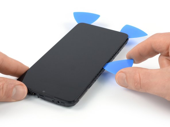 Xiaomi Redmi Note 9T Screen Replacement, Slice the left edge adhesive: crwdns2935265:032crwdnd2935265:02crwdnd2935265:03crwdne2935265:0