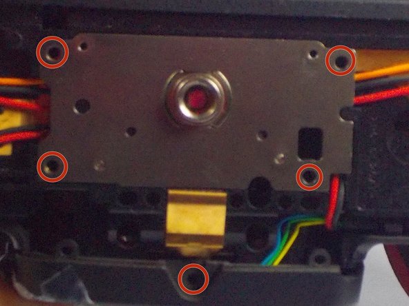 Nikon D90 Tripod Thread Plate Replacement, Removing Screws: crwdns2935265:04crwdnd2935265:02crwdnd2935265:02crwdne2935265:0