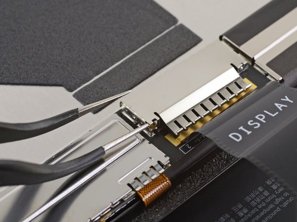 Microsoft Surface Pro X Screen Replacement, Remove the display cable shield: crwdns2935265:016crwdnd2935265:03crwdnd2935265:03crwdne2935265:0