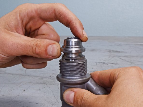 Titan High Pressure Airless Sprayer Elite 3000 Inlet Valve Replacement, Remove the inlet valve: step 5, image 2 of 3