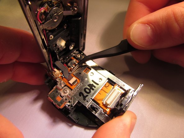 Panasonic SDR H-100 Zoom Lever Replacement: crwdns2935265:011crwdnd2935265:02crwdnd2935265:02crwdne2935265:0