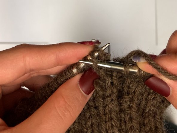 How to Pick Up a Dropped Stitch in Knitting: step 6, image 3 of 3