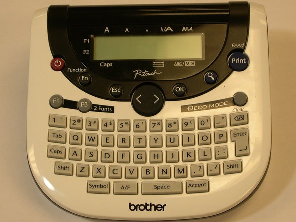 Brother PT-1290 Cutter Blade Replacement, Putting the pieces back together: crwdns2935265:04crwdnd2935265:03crwdnd2935265:03crwdne2935265:0