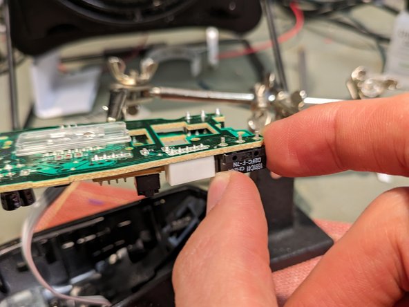 Logitech M500 Mouse Switch Replacement, Desolder the old switch: crwdns2935265:010crwdnd2935265:02crwdnd2935265:02crwdne2935265:0