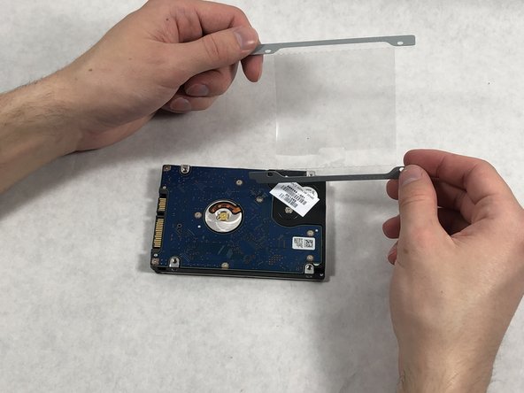 HP Pavilion g7-2023cl Hard Drive Mounting Bracket Replacement: crwdns2935265:012crwdnd2935265:02crwdnd2935265:02crwdne2935265:0