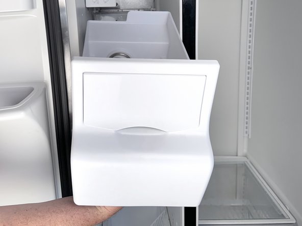 Frigidaire Side-By-Side Refrigerator Evaporator Fan Cover Removal, Remove the ice bin: crwdns2935265:02crwdnd2935265:02crwdnd2935265:02crwdne2935265:0